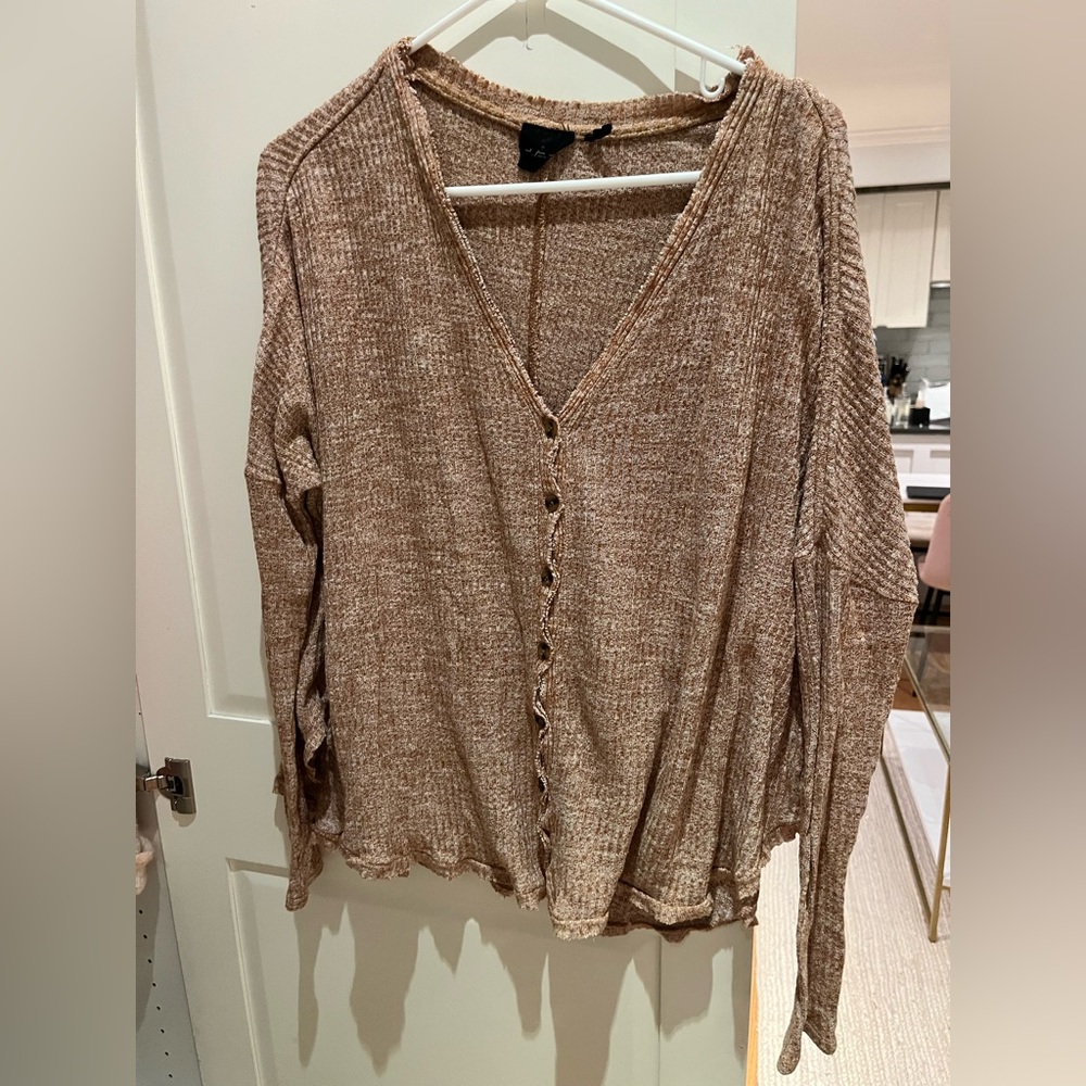 Out from under sweater top